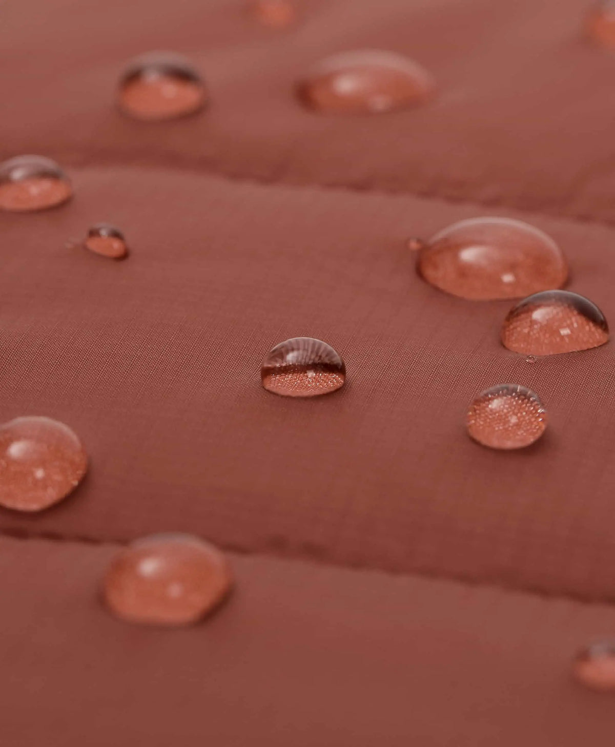 Close-up of redfern ororo Kids' 4-Zone Heated Lightweight Puffer Jacket showing Water resistant