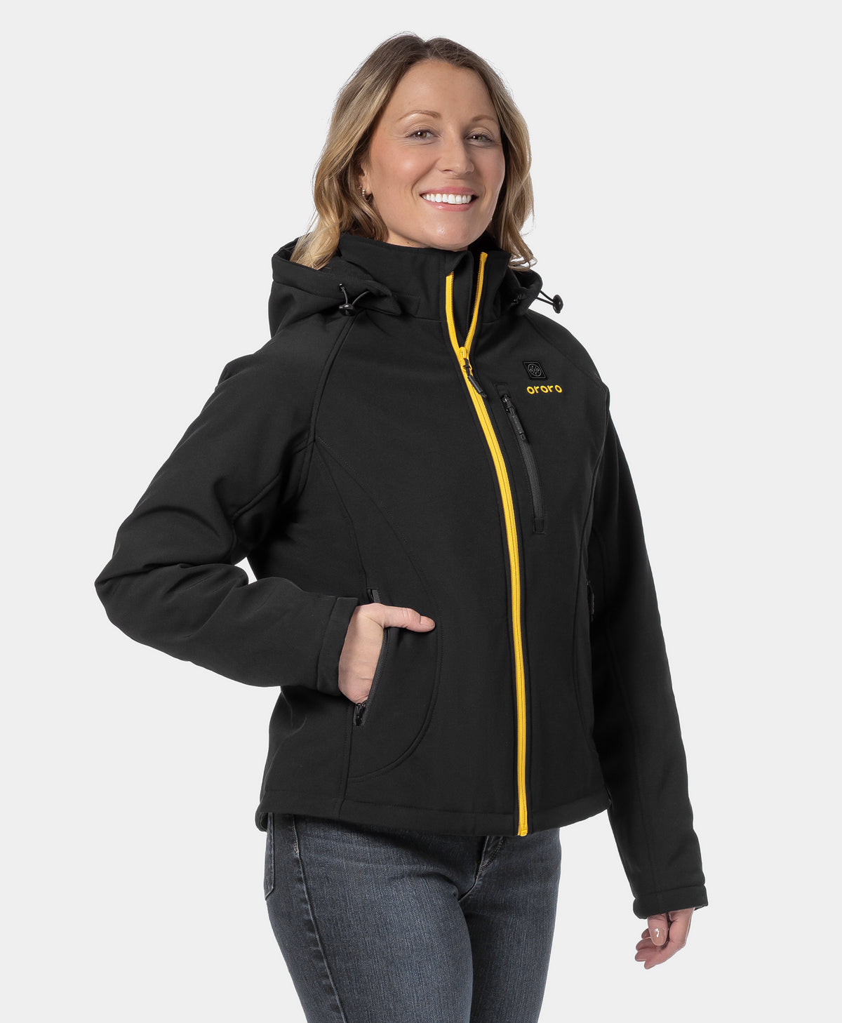 Woman wearing the black ororo Women's Classic Heated Jacket 2.0 with hood and yellow front zipper