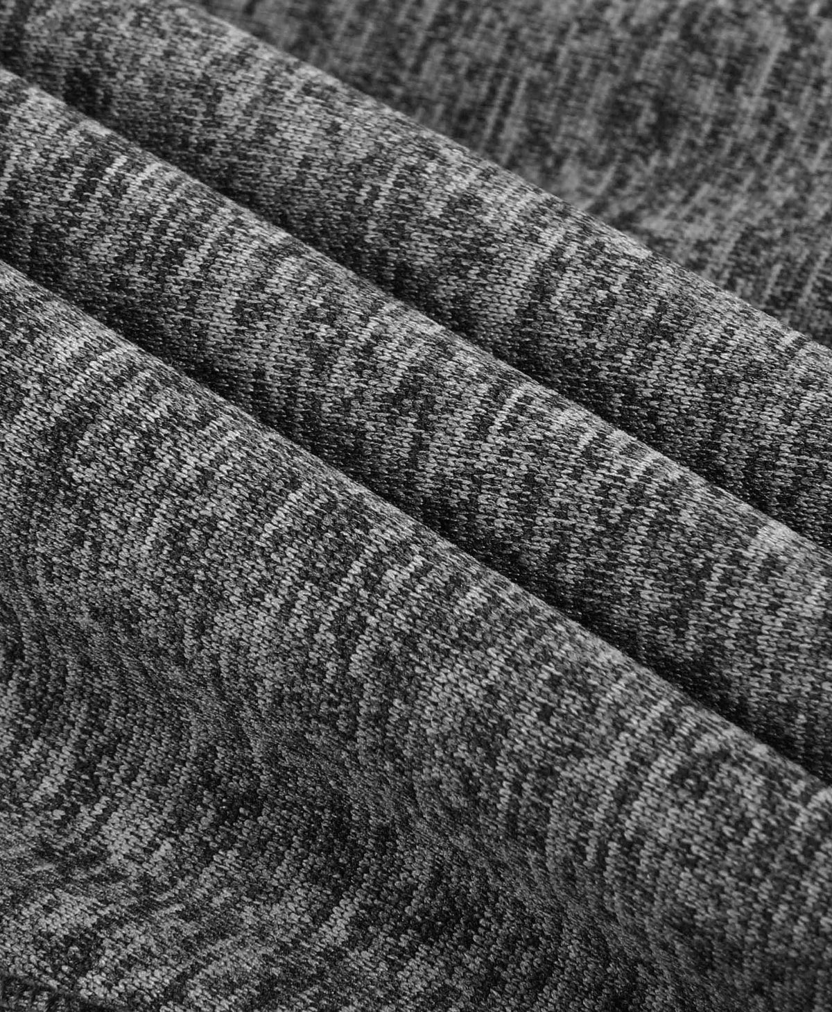 Close-up view of soft heather gray fleece fabric texture