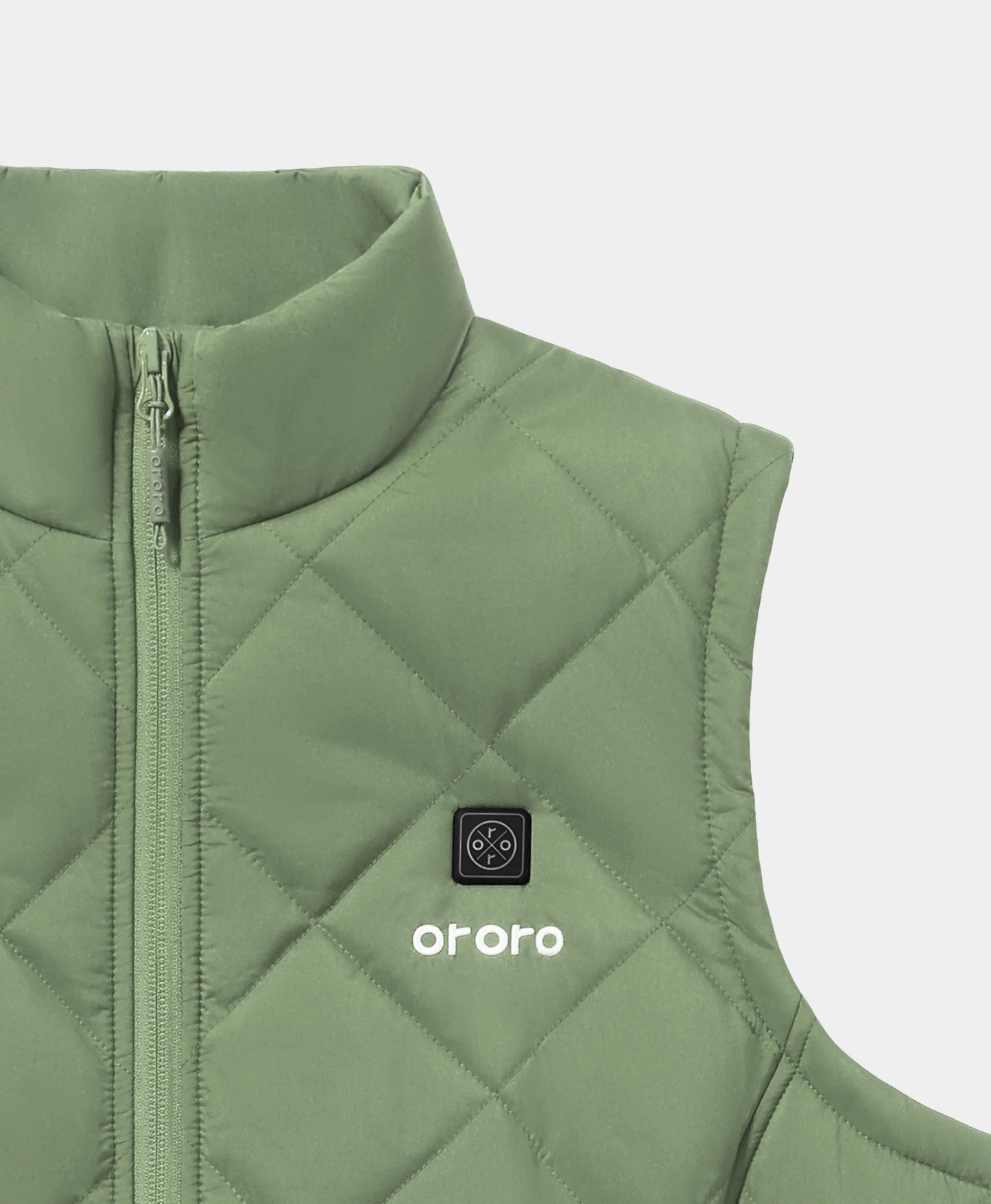 Close-up front view of hedge green ororo Women's Heated Quilted Vest showing stand collar, front zipper, and LED power control switch above the white ororo logo