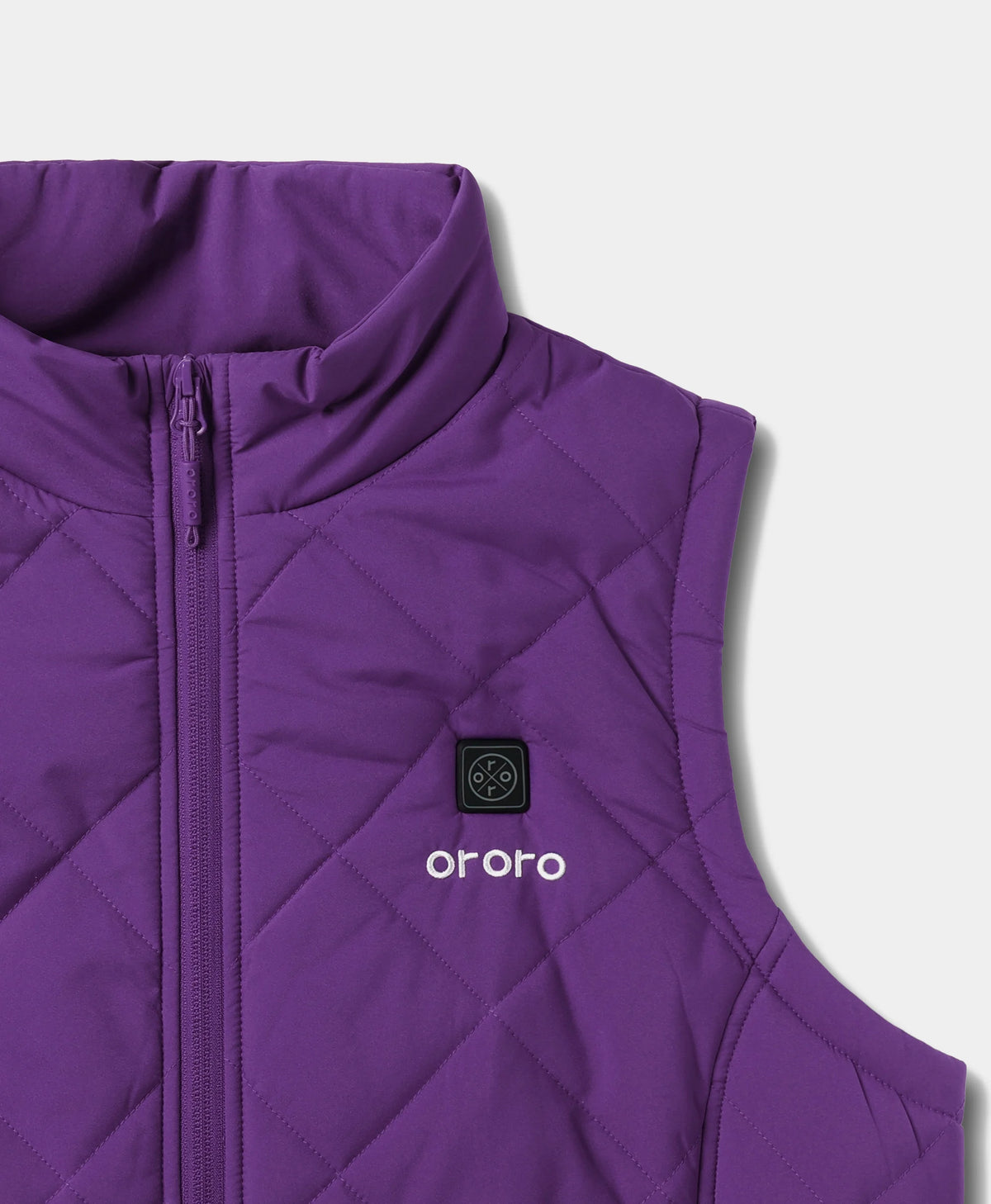 ororo Women's Heated Quilted Vest with stand collar, chest heating button, and embroidered logo