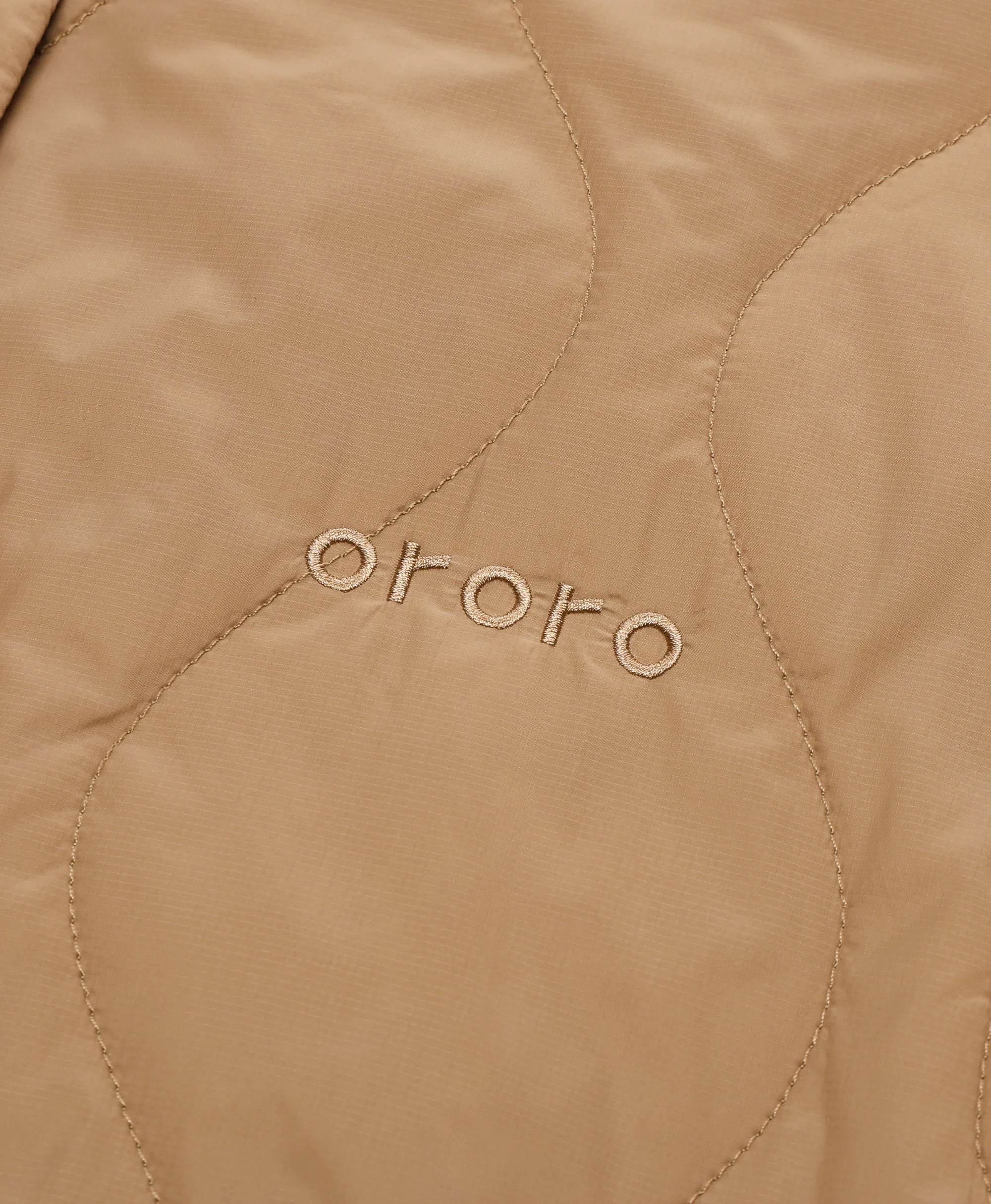 Women's 4-Zone Lightweight Heated Quilted Liner Vest- logo detail