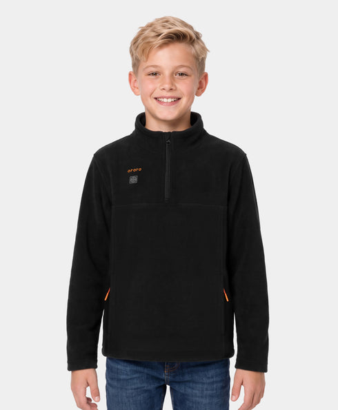 A smiling young boy wearing ororo Kids' 4-Zone Heated Fleece Qtr Zip Jacket 