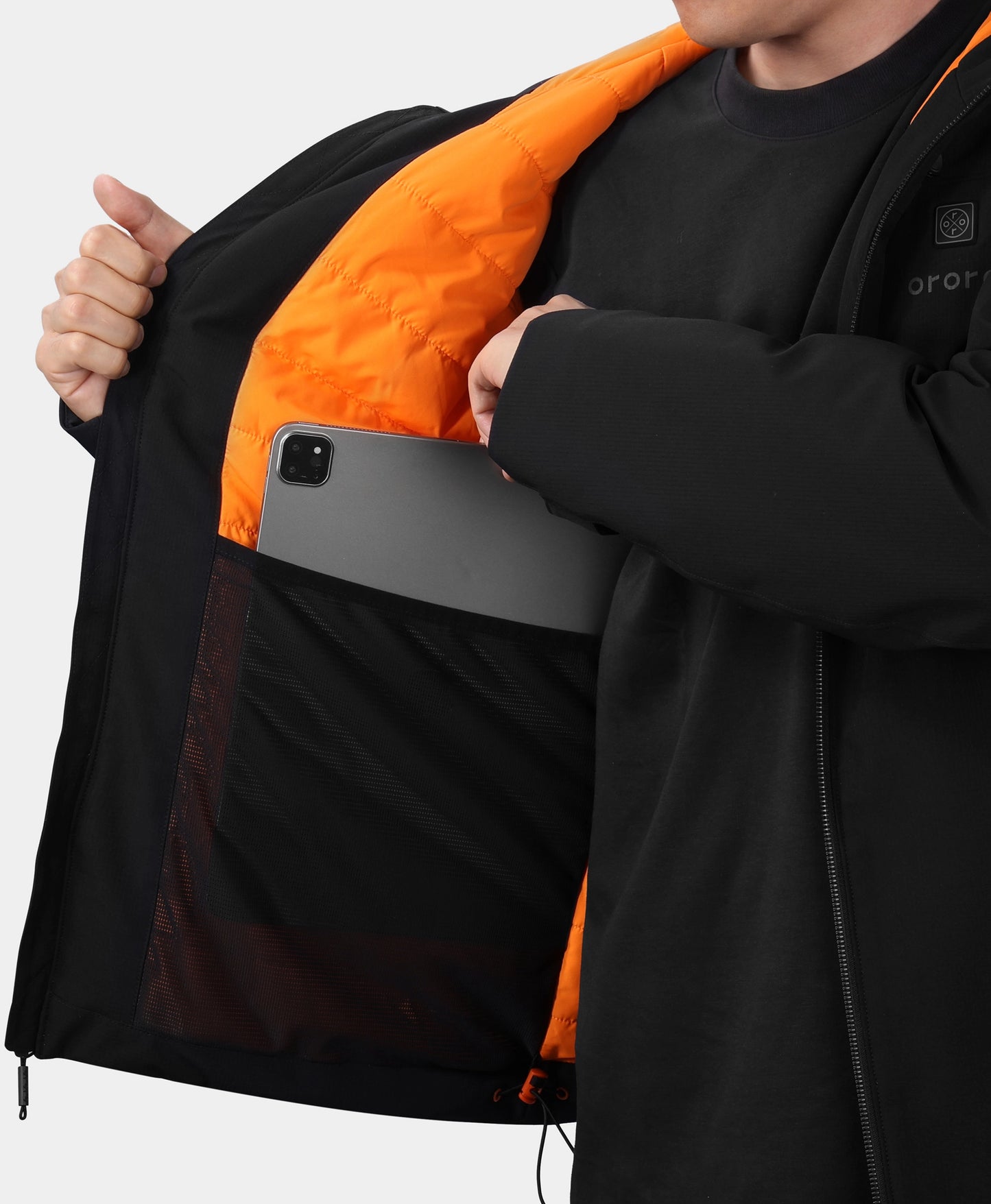 Close-up of ororo Heartland Men's 5-Zone Heated Insulated Hoodie inside pocket