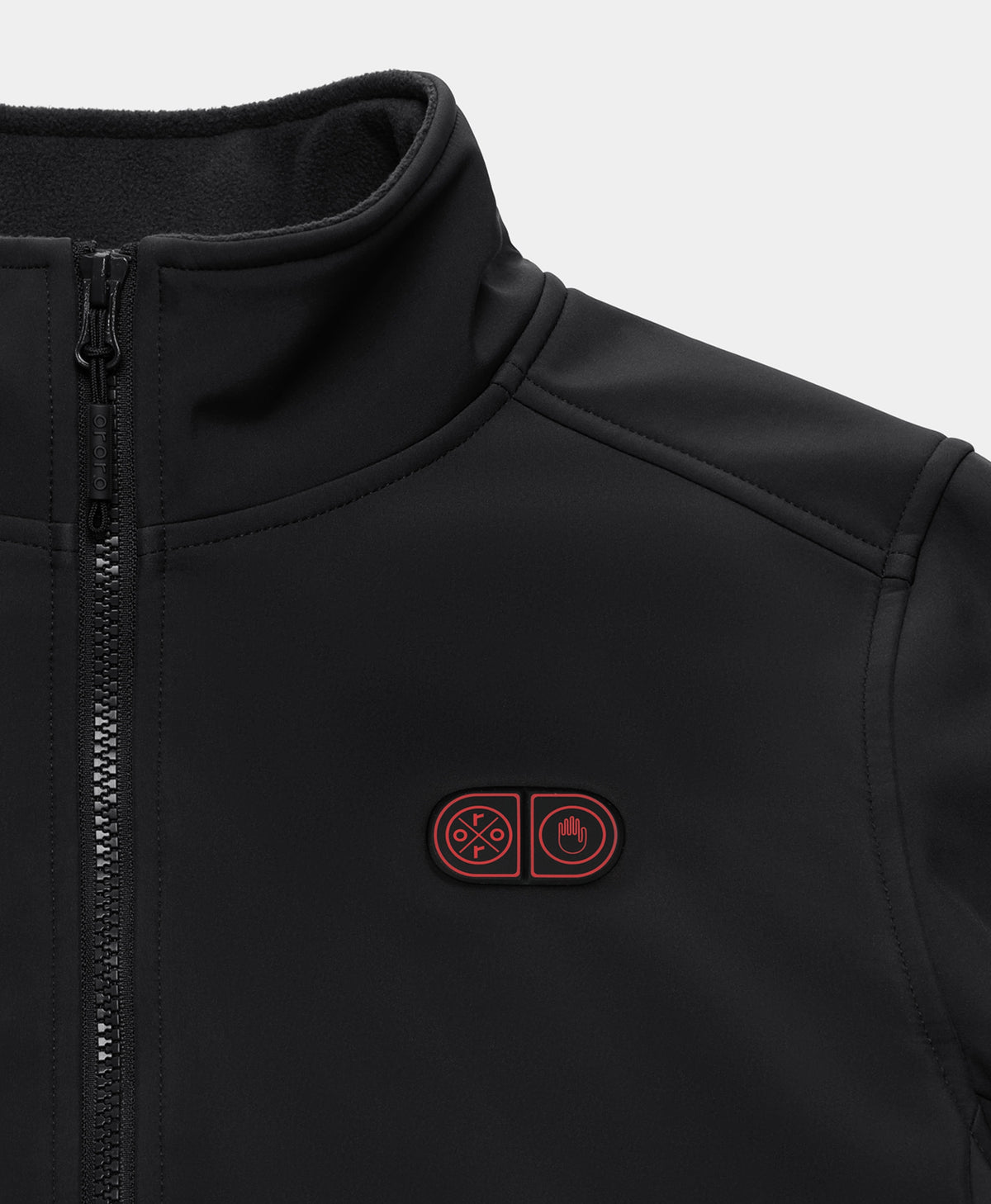 Dual-control buttons on the left chest for separate pocket and core heating