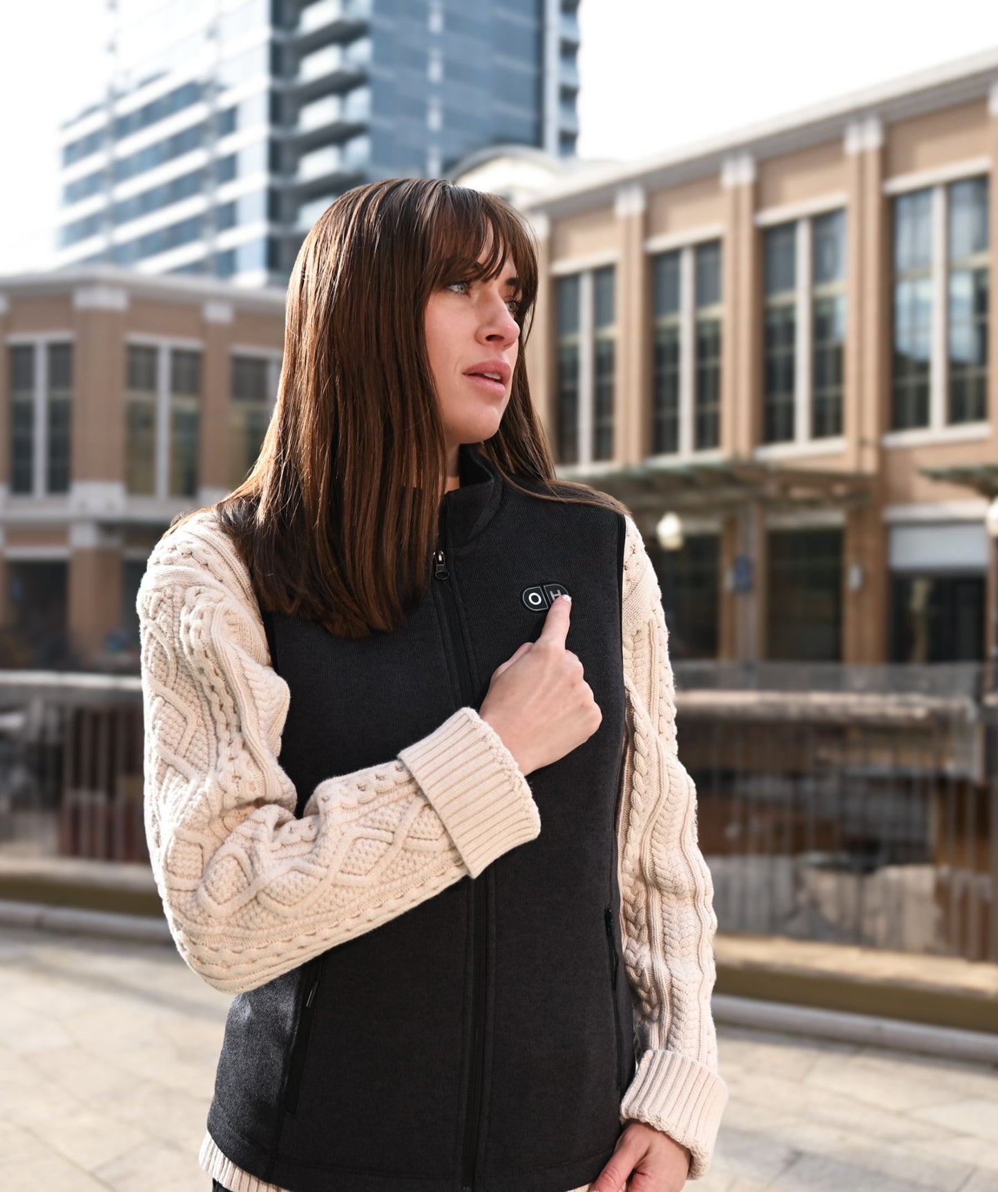OH-1 Women’s Heated Recycled Fleece Vest- product usage scenario illustration- woman go outside