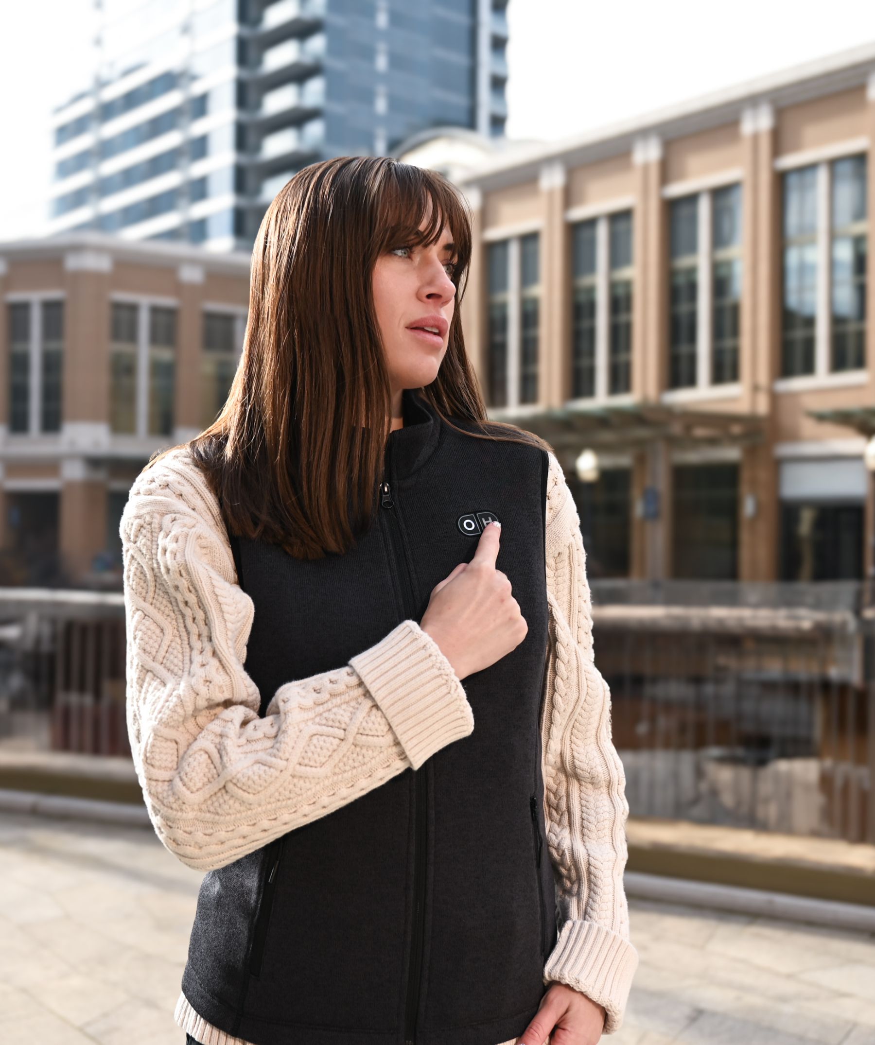 OH-1 Women’s Heated Recycled Fleece Vest- product usage scenario illustration- woman go outside