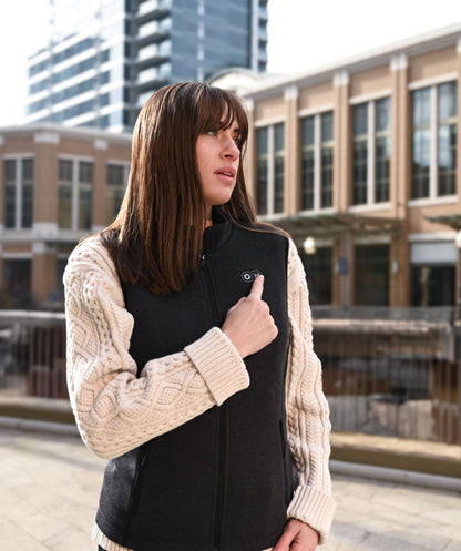 OH-1 Women’s Heated Recycled Fleece Vest- product usage scenario illustration- woman go outside