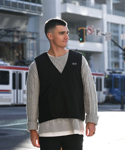 OH-2 Unisex Ultralight Heated Liner Vest- man with the vest on street