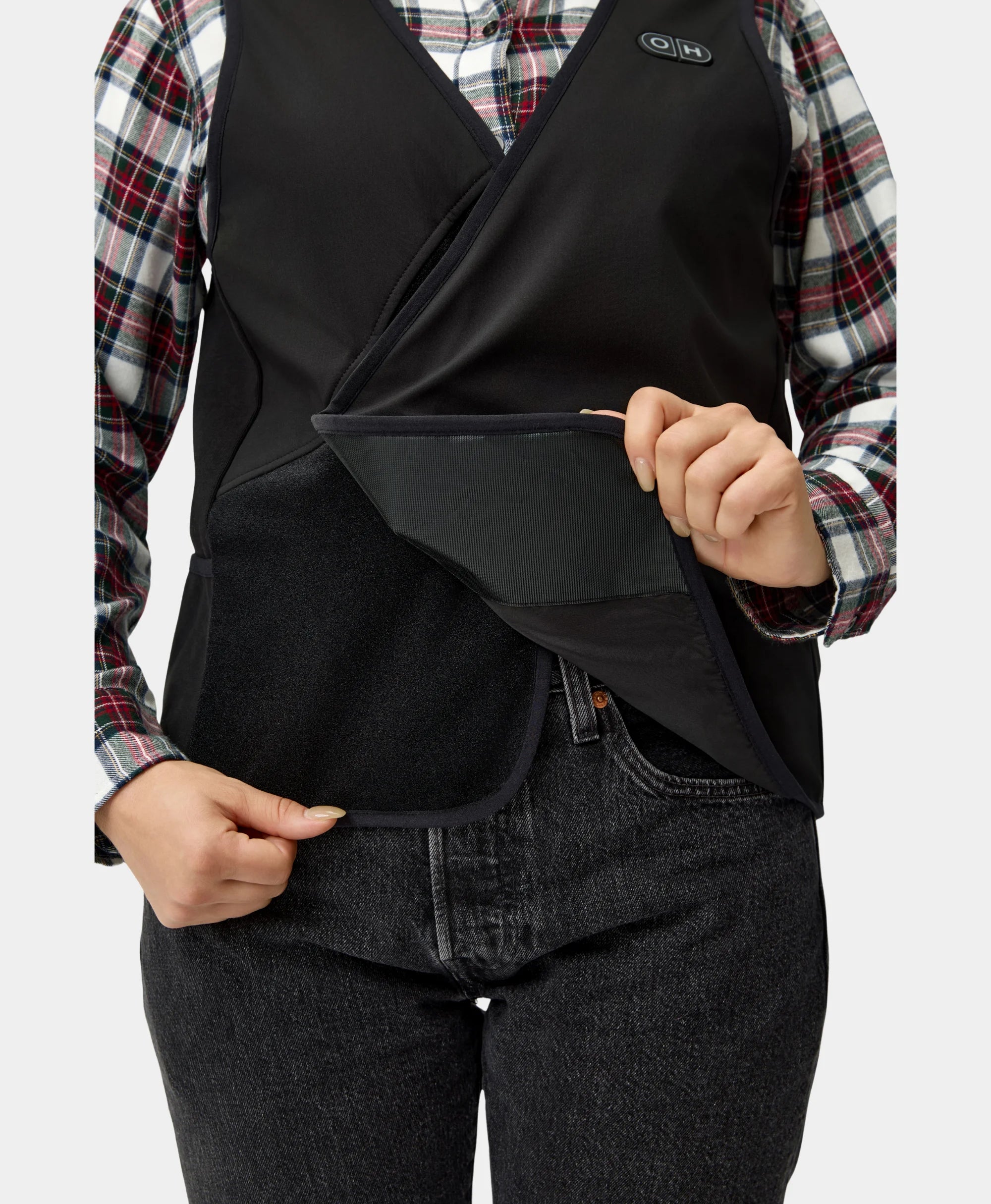 Female model shows inside part of the vest