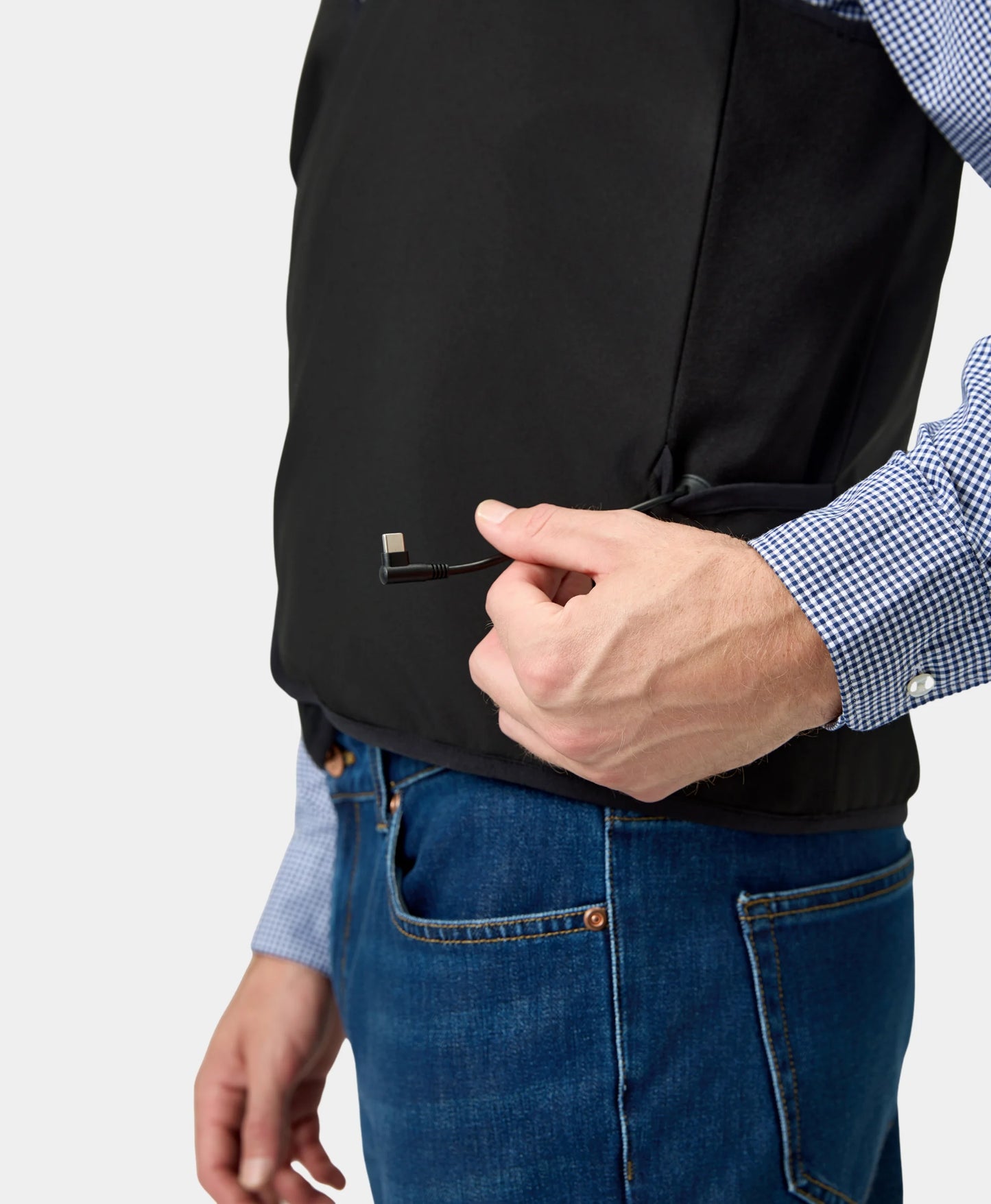 There is a loop on the side of the vest used to secure the heating battery cable