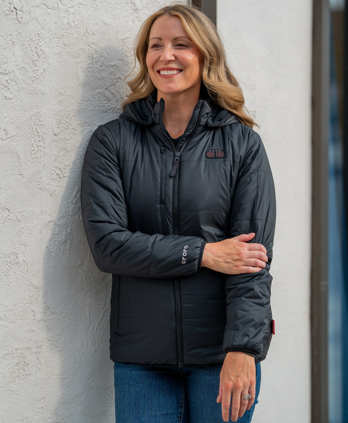 Women's Overland 7-Zone Heated Box Quilted Jacket with Heated Hood in black, worn outdoors